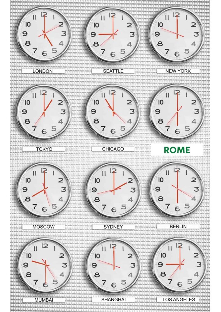 12 cocks on a grey wall showing cities in different global time zones.