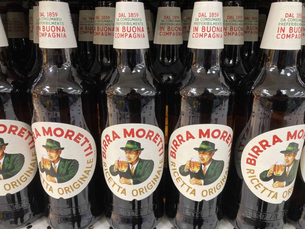 Moretti beer on display at a grocery store in Italy.