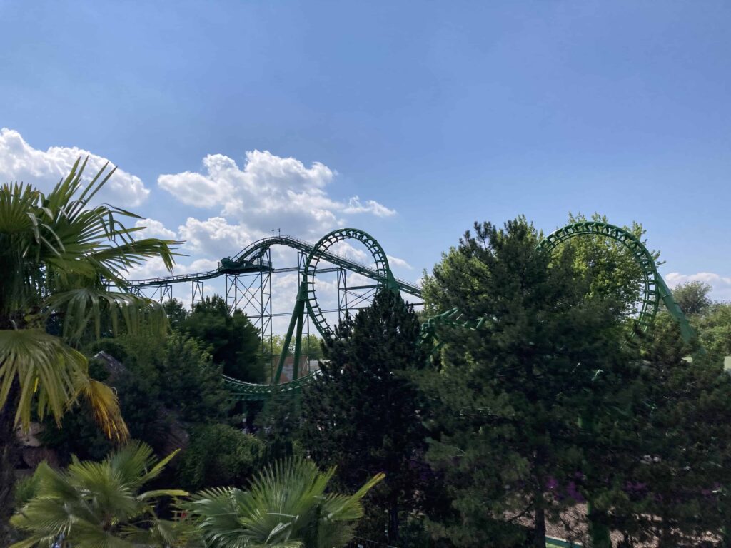 Trees and roller coaster at Gardaland in Italy.