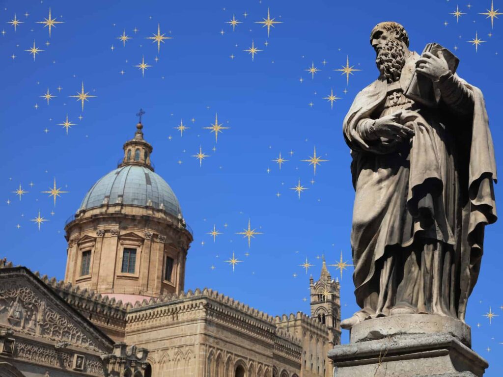 Patron saint of Palermo as a statue by the cathedral. Graphic stars in the sky.