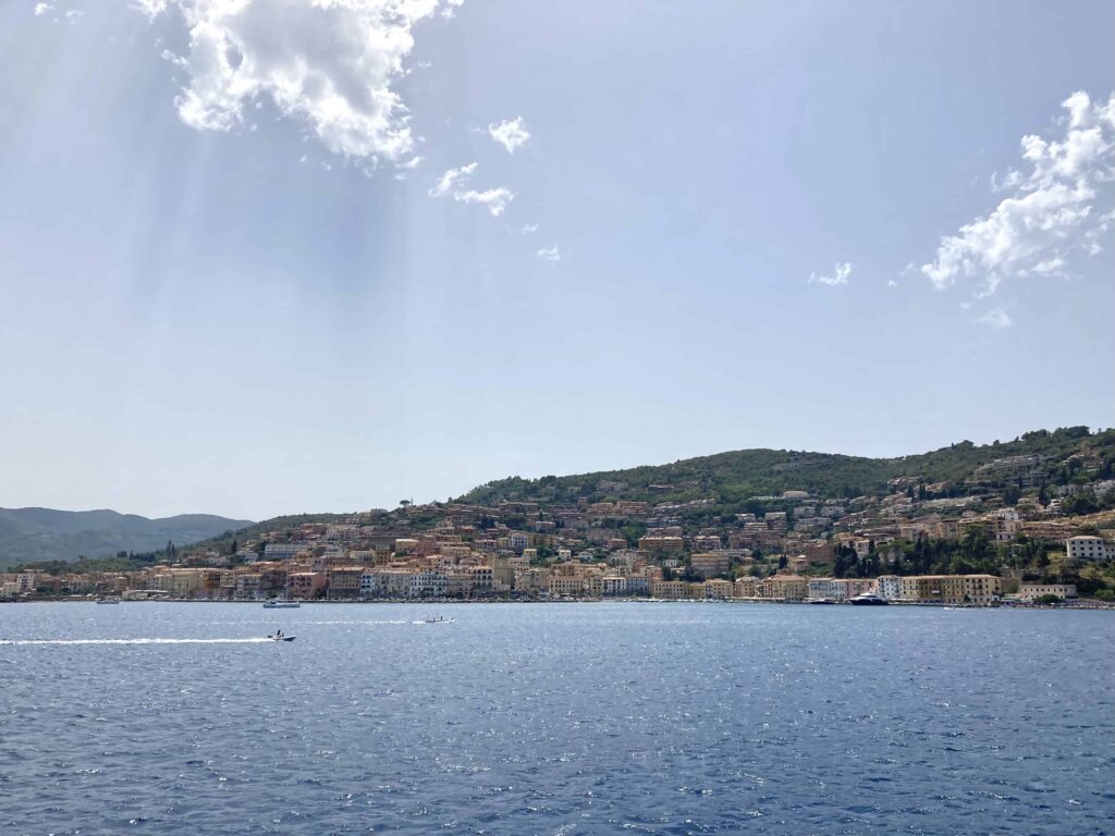 View of Porto Santo Stefano. Water in foreground.