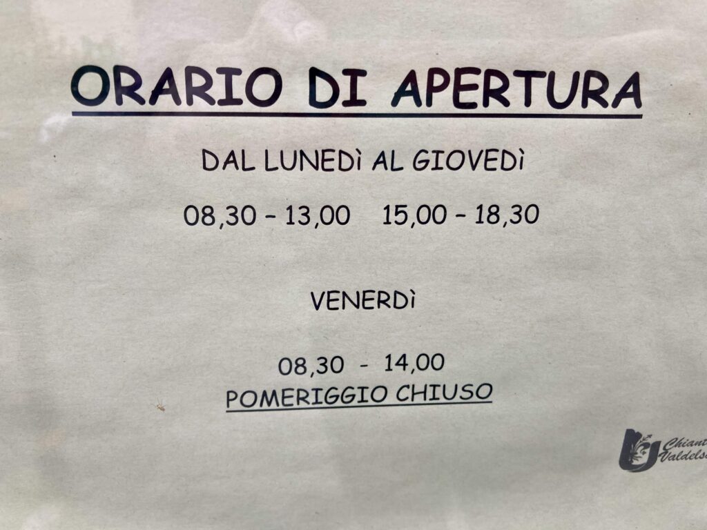 Sign in Italian listing opening days and hours.